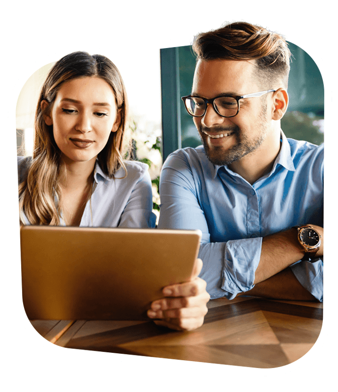 A couple looking at a laptop