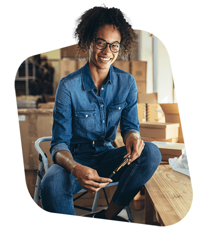 Woman smiling while on a stool