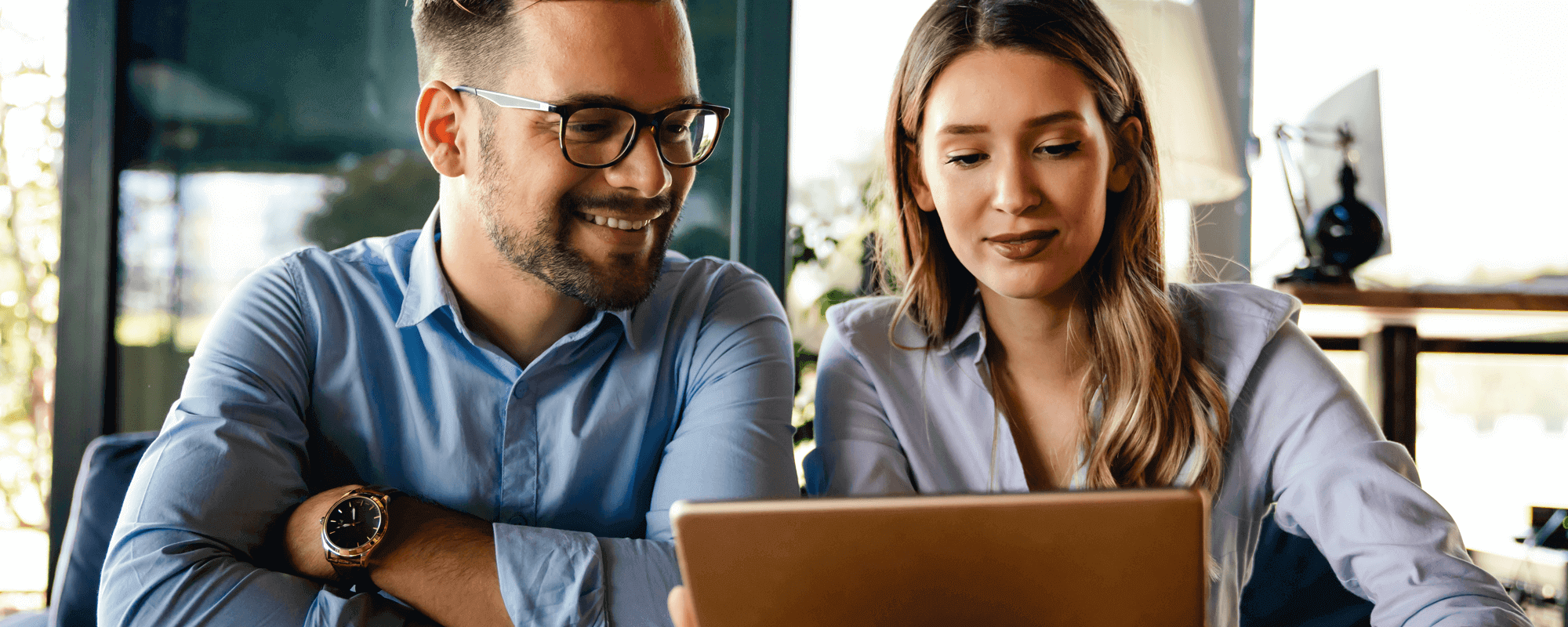 A couple looking at a laptop