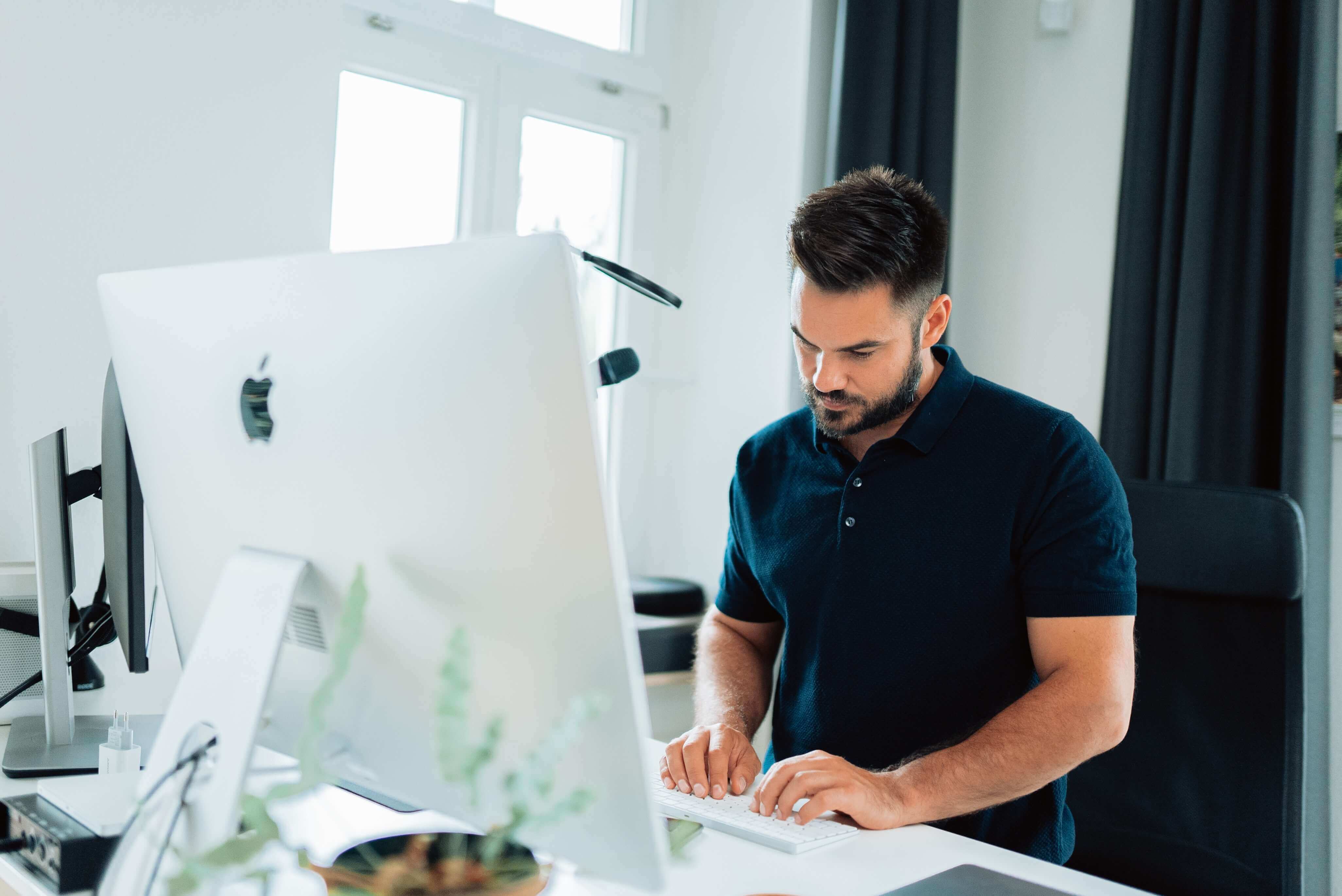 Man working on a PC computer