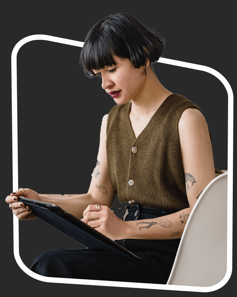 Woman drawing on a tablet computer