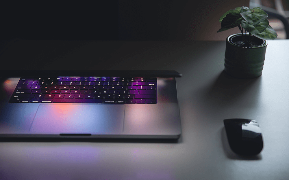 A laptop sitting on a desk